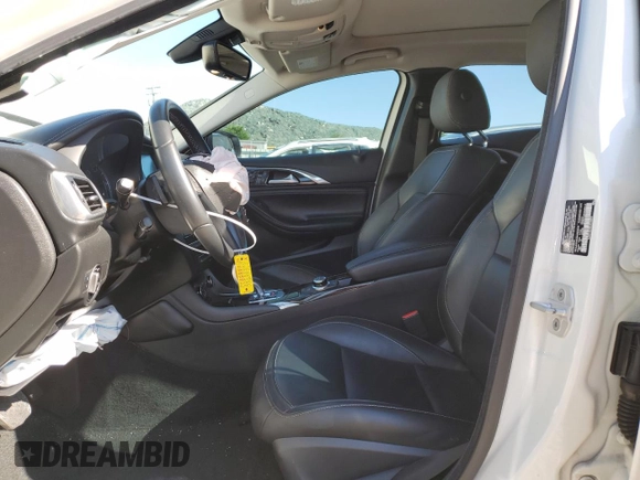 2018 Infiniti QX30 Luxury with VIN SJKCH5CR0JA048278, listed as a Copart auction lot 67345054 with 53,299 mi miles and Salvage Title. Bid and sale history available at DreamBid. Image 7.