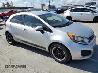 2012 Kia Rio LX with VIN KNADM5A37C6092993, listed as a Copart auction lot 48458034 with 108,314 mi miles and Salvage Title. Bid and sale history available at DreamBid. Image 4.