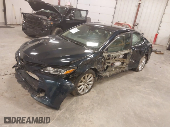 2020 Toyota Camry LE with VIN 4T1C11AK5LU926564, listed as a IAAI auction lot 41864812 with 104,212 mi miles and . Bid and sale history available at carsss.com. Image 17.