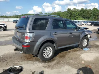 2010 Mercury Mariner Premier with VIN 4M2CN8HG5AKJ00531, listed as a Copart auction lot 68167794 with 184,969 mi miles and Salvage Title. Bid and sale history available at carsss.com. Image 3.