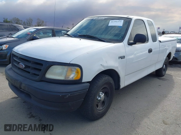 2000 Ford F-150 XL with VIN 1FTZX1727YKA78887, listed as a IAAI auction lot 41291272 with 289,343 mi miles. Bid and sale history available at carsss.com. Image 2.
