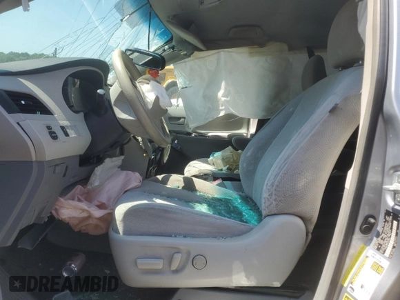 2014 Toyota Sienna LE AAS with VIN 5TDKK3DC5ES447565, listed as a Copart auction lot 52301335 with 0 mi miles and Salvage Title. Bid and sale history available at carsss.com. Image 7.