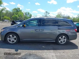 2011 Honda Odyssey Touring Elite with VIN 5FNRL5H96BB043339, listed as a IAAI auction lot 42174767 with 161,233 mi miles and . Bid and sale history available at DreamBid. Image 14.