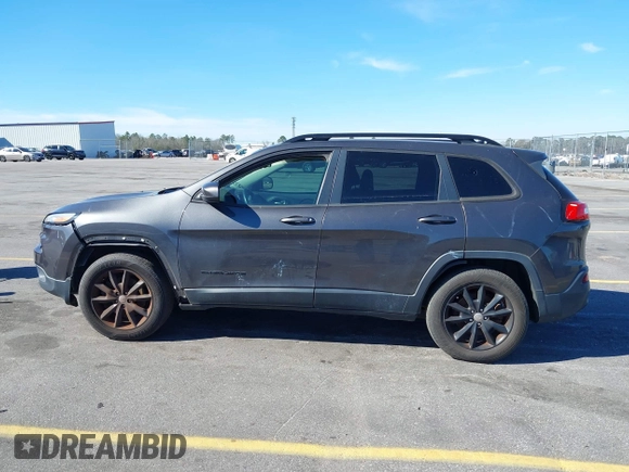 2014 Jeep Cherokee Latitude with VIN 1C4PJMCS3EW298340, listed as a IAAI auction lot 41708488 with 217,438 mi miles and . Bid and sale history available at DreamBid. Image 14.