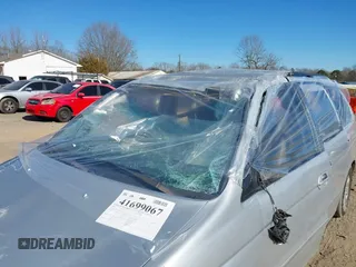 2004 Honda Odyssey EX-L with VIN 5FNRL18924B107971, listed as a IAAI auction lot 41699067 with Not Provided miles and . Bid and sale history available at DreamBid. Image 6.