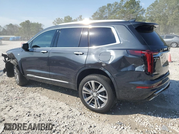 2022 Cadillac XT6 Premium Luxury with VIN 1GYKPCRS1NZ104567, listed as a Copart auction lot 47173005 with 54,541 mi miles and Clean Title. Bid and sale history available at carsss.com. Image 2.