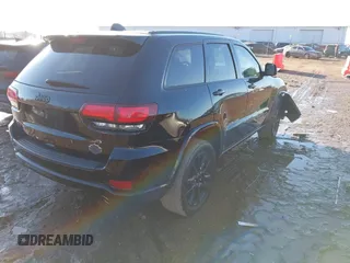2019 Jeep Grand Cherokee Laredo E with VIN 1C4RJFAG0KC546365, listed as a IAAI auction lot 41664891 with 160,640 mi miles. Bid and sale history available at carsss.com. Image 4.