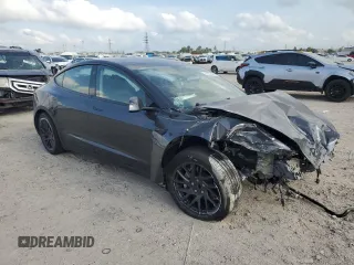 2024 Tesla Model 3 with VIN 5YJ3E1EA5RF741345, listed as a Copart auction lot 51535165 with 7,372 mi miles and Salvage Title. Bid and sale history available at DreamBid. Image 4.