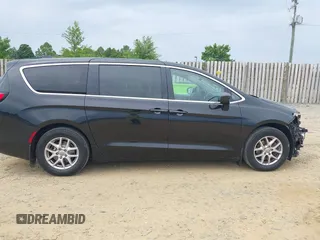 2017 Chrysler Pacifica Touring with VIN 2C4RC1DG8HR502333, listed as a IAAI auction lot 42357607 with 105,266 mi miles and . Bid and sale history available at DreamBid. Image 13.