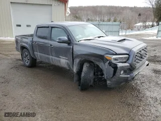 2023 Toyota Tacoma 4WD SR with VIN 3TYCZ5AN2PT156093, listed as a Copart auction lot 45577245 with 33,687 mi miles and Salvage Title. Bid and sale history available at carsss.com. Image 4.