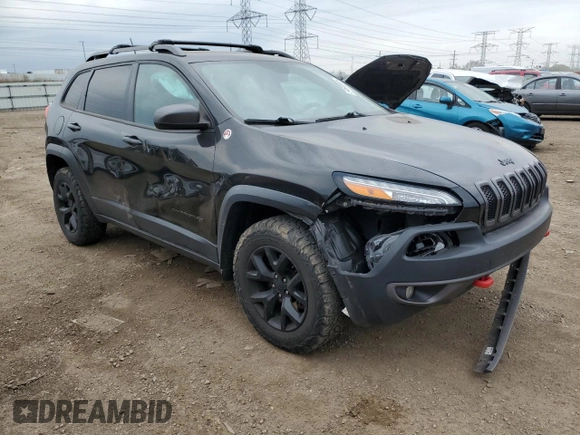 2015 Jeep Cherokee Trailhawk с VIN 1C4PJMBB5FW615179, выставлен на аукционе Copart как лот 54600985 с пробегом 133 724 миль миль и Списание • Salvage title. История ставок и продаж доступна на DreamBid. Изображение 4.
