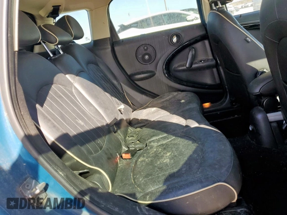 2012 MINI Countryman S with VIN WMWZC3C5XCWM27675, listed as a Copart auction lot 49676205 with 111,499 mi miles and Salvage title. Bid and sale history available at DreamBid. Image 10.