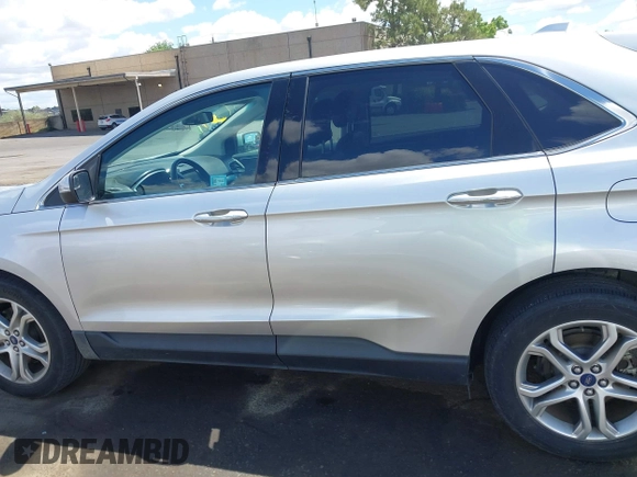 2015 Ford Edge Titanium z VIN 2FMTK4K95FBB47962, wystawiony jako IAAI lot #42234894 z przebiegiem Nie podano mil oraz . Historia ofert i sprzedaży dostępna na DreamBid. Obrazek 14.