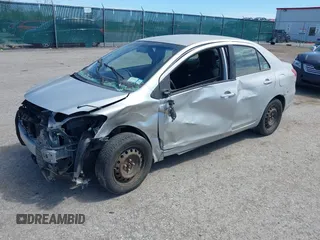 2012 Toyota Yaris with VIN JTDBT4K34CL018101, listed as a IAAI auction lot 42144626 with 138,732 mi miles. Bid and sale history available at carsss.com. Image 2.