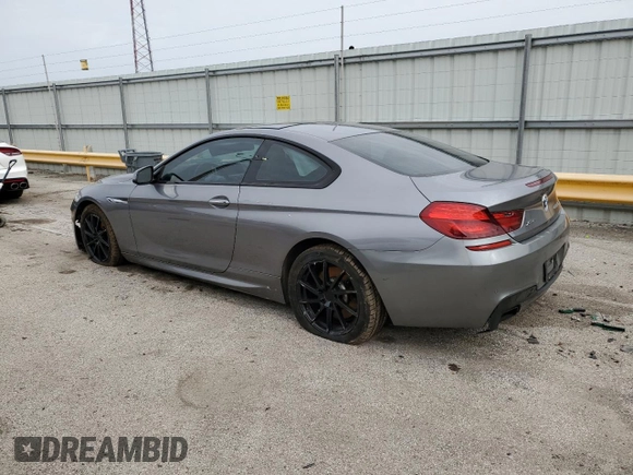 2013 BMW 6 Series 650i xDrive z VIN WBAYM1C53DDZ02397, wystawiony jako Copart lot #48872655 z przebiegiem Nie podano mil oraz Szkoda całkowita • Salvage title. Historia ofert i sprzedaży dostępna na DreamBid. Obrazek 2.
