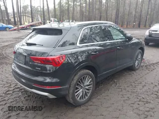 2021 Audi Q3 Premium with VIN WA1AUCF34M1148531, listed as a IAAI auction lot 41815286 with 31,934 mi miles and . Bid and sale history available at DreamBid. Image 4.