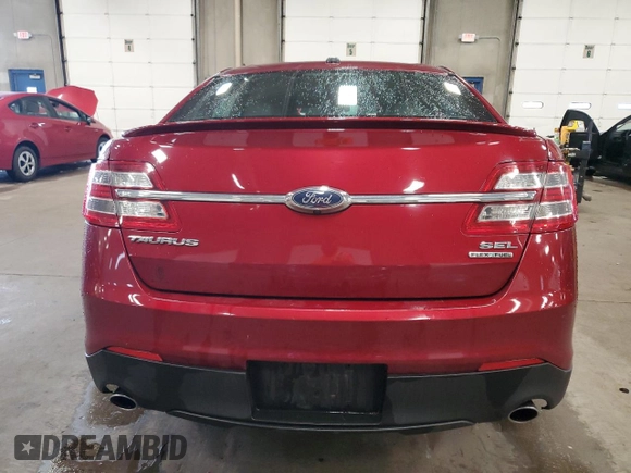 2016 Ford Taurus SEL with VIN 1FAHP2E81GG125802, listed as a Copart auction lot 62491045 with 99,704 mi miles and Salvage title. Bid and sale history available at DreamBid. Image 6.