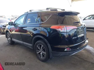 2018 Toyota RAV4 XLE with VIN 2T3WFREV2JW502622, listed as a IAAI auction lot 42327598 with 94,997 mi miles and . Bid and sale history available at DreamBid. Image 3.