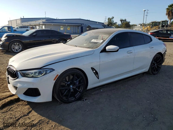 2022 BMW 8 Series 840i with VIN WBAGV2C0XNCG81832, listed as a Copart auction lot 74798684 with 27,972 mi miles and Salvage Title. Bid and sale history available at carsss.com. Image 1.
