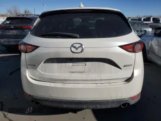2018 Mazda CX-5 Grand Touring with VIN JM3KFADM3J1410210, listed as a Copart auction lot 44031365 with 69,016 mi miles and Clean Title. Bid and sale history available at DreamBid. Image 6.
