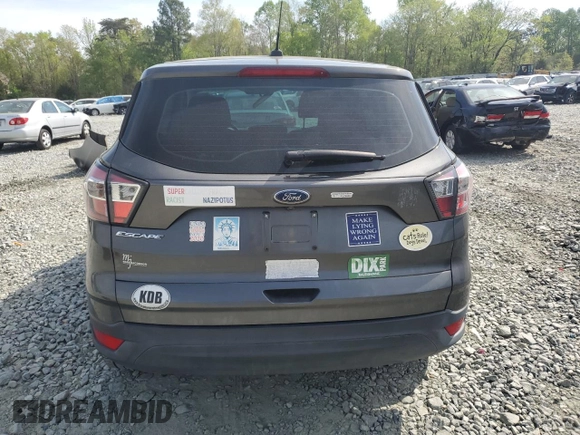 2017 Ford Escape S with VIN 1FMCU0F79HUB36083, listed as a Copart auction lot 51093174 with 59,928 mi miles and Salvage title. Bid and sale history available at DreamBid. Image 6.