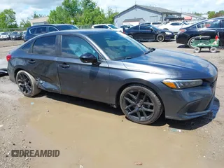 2022 Honda Civic Sport z VIN 2HGFE2F58NH560511, wystawiony jako IAAI lot #42346044 z przebiegiem 51 357 mil mil oraz . Historia ofert i sprzedaży dostępna na DreamBid. Obrazek 14.