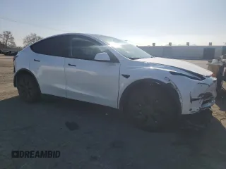 2024 Tesla Model Y with VIN 7SAYGDED1RF212974, listed as a Copart auction lot 44776005 with 16,841 mi miles and Salvage Title. Bid and sale history available at DreamBid. Image 4.