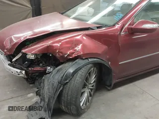 2006 Acura RL z VIN JH4KB16566C008802, wystawiony jako IAAI lot #41457360 z przebiegiem 212 443 mil mil oraz . Historia ofert i sprzedaży dostępna na DreamBid. Obrazek 6.