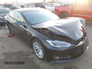 2016 Tesla Model S 90D with VIN 5YJSA1E26GF156108, listed as a IAAI auction lot 41453148 with 74,717 mi miles and . Bid and sale history available at DreamBid. Image 1.
