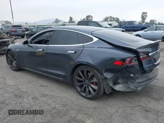2016 Tesla Model S 90D с VIN 5YJSA1E45GF143853, выставлен на аукционе IAAI как лот 42097333 с пробегом 86 672 миль миль и . История ставок и продаж доступна на DreamBid. Изображение 3.