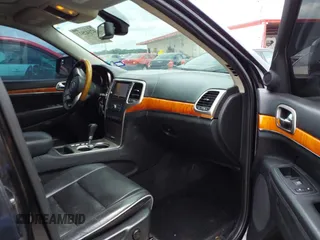 2013 Jeep Grand Cherokee Overland with VIN 1C4RJECT2DC588124, listed as a IAAI auction lot 42142573 with 204,309 mi miles and . Bid and sale history available at DreamBid. Image 5.