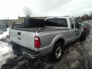 2012 Ford Super Duty F-250 SRW XL with VIN 1FT7X2B61CED13945, listed as a IAAI auction lot 41662333 with 196,509 mi miles. Bid and sale history available at carsss.com. Image 4.