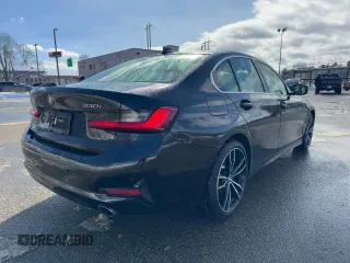 2021 BMW 3 Series 330i with VIN 3MW5R1J04MBB48483, listed as a Copart auction lot 46145125 with 128,555 mi miles and Clean Title. Bid and sale history available at carsss.com. Image 4.