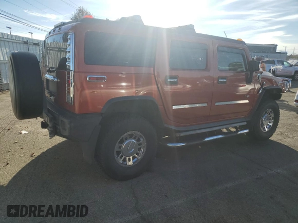 2003 Hummer H2 with VIN 5GRGN23U83H115153, listed as a Copart auction lot 79878644 with 0 mi miles and Salvage Title. Bid and sale history available at carsss.com. Image 3.