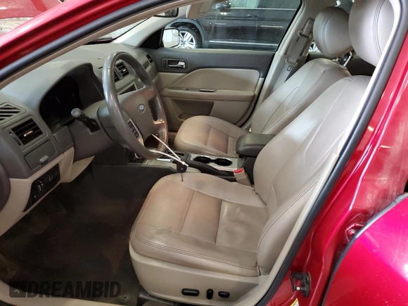 2012 Ford Fusion SEL z VIN 3FAHP0JG0CR265666, wystawiony jako Copart lot #62860355 z przebiegiem 126 812 mil mil oraz Szkoda całkowita • Salvage title. Historia ofert i sprzedaży dostępna na DreamBid. Obrazek 7.