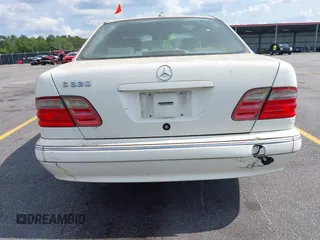 2002 Mercedes-Benz E-Class with VIN WDBJF65J22B432263, listed as a IAAI auction lot 42130545 with 220,852 mi miles. Bid and sale history available at carsss.com. Image 14.
