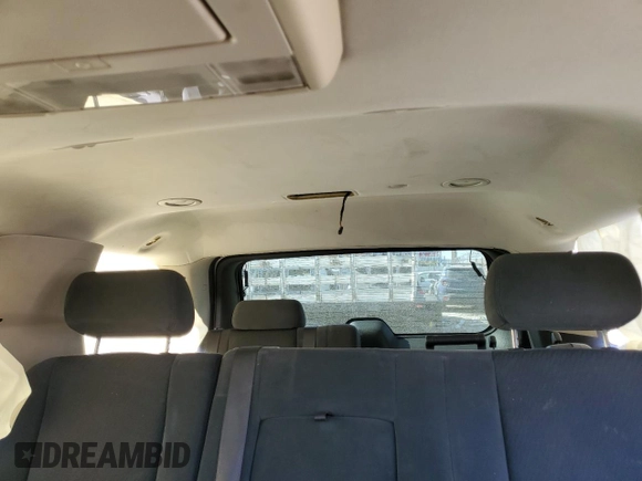 2009 Chevrolet Tahoe 2LT z VIN 1GNFC23099R166302, wystawiony jako Copart lot #57083975 z przebiegiem 191 598 mil mil oraz Szkoda całkowita • Salvage title. Historia ofert i sprzedaży dostępna na DreamBid. Obrazek 10.