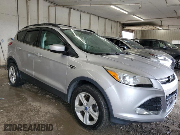 2013 Ford Escape SE with VIN 1FMCU9GX3DUD32274, listed as a Copart auction lot 63778235 with 161,288 mi miles and Salvage title. Bid and sale history available at DreamBid. Image 4.