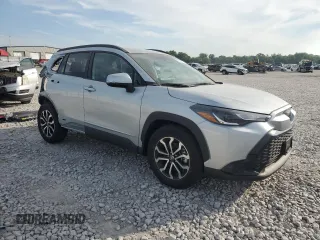 2023 Toyota Corolla Cross Hybrid S with VIN 7MUFBABG4PV004988, listed as a Copart auction lot 62098725 with 11,874 mi miles and Salvage title. Bid and sale history available at DreamBid. Image 4.