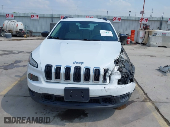 2015 Jeep Cherokee Sport with VIN 1C4PJLAB6FW602355, listed as a IAAI auction lot 41962707 with 175,428 mi miles. Bid and sale history available at carsss.com. Image 13.