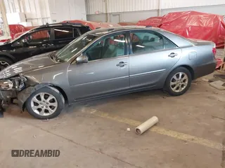 2005 Toyota Camry LE with VIN 4T1BF30K15U591137, listed as a IAAI auction lot 41681990 with 231,555 mi miles and . Bid and sale history available at DreamBid. Image 2.