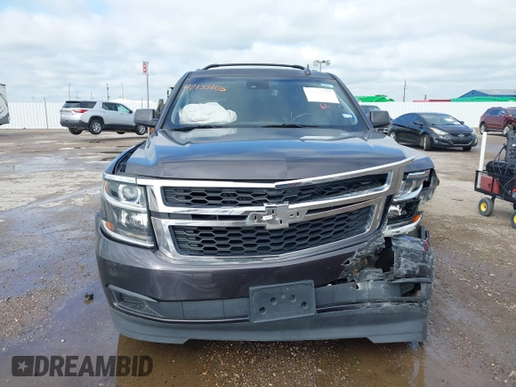 2015 Chevrolet Tahoe LT with VIN 1GNSCBKC2FR632173, listed as a IAAI auction lot 42135105 with 150,033 mi miles and . Bid and sale history available at DreamBid. Image 12.