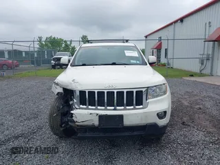 2011 Jeep Grand Cherokee Laredo with VIN 1J4RR4GG6BC680943, listed as a IAAI auction lot 42419575 with 188,672 mi miles and . Bid and sale history available at DreamBid. Image 12.