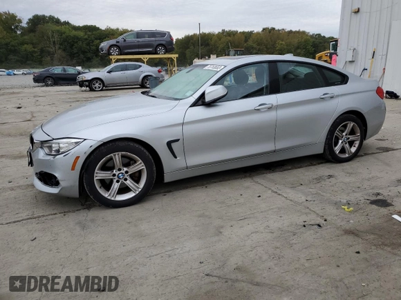 2015 BMW 4 Series 428i xDrive with VIN WBA4C9C5XFG135391, listed as a Copart auction lot 70753653 with 70,870 mi miles and . Bid and sale history available at DreamBid. Image 1.