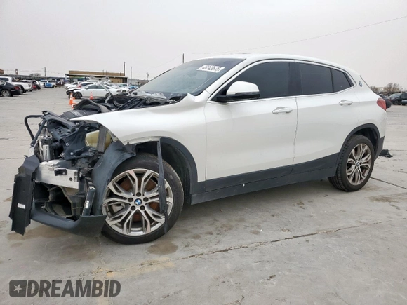 2022 BMW X2 xDrive28i with VIN WBXYJ1C02N5U07106, listed as a Copart auction lot 48243575 with 65,140 mi miles and Clean Title. Bid and sale history available at carsss.com. Image 1.