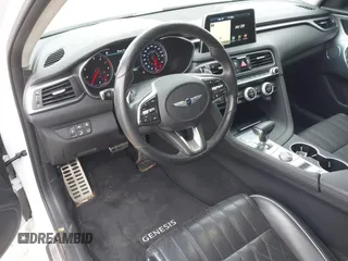 2020 Genesis G70 3.3T with VIN KMTG34LEXLU060919, listed as a IAAI auction lot 41619579 with 69,859 mi miles. Bid and sale history available at carsss.com. Image 18.