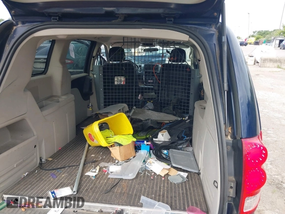 2013 Ram Cargo Van Tradesman with VIN 2C4JRGAG7DR781870, listed as a IAAI auction lot 39762348 with 114,717 mi miles and . Bid and sale history available at DreamBid. Image 8.