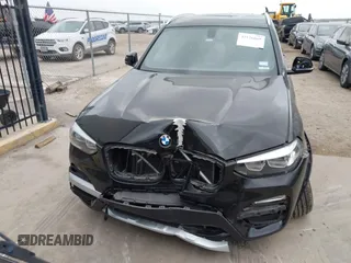 2018 BMW X3 xDrive30i with VIN 5UXTR9C52JLD59351, listed as a IAAI auction lot 42126069 with 30,806 mi miles and . Bid and sale history available at DreamBid. Image 12.