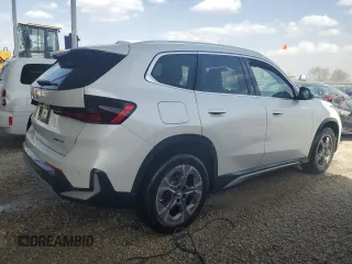2024 BMW X1 xDrive28i with VIN WBX73EF07R5007573, listed as a Copart auction lot 49054865 with 21,009 mi miles and Clean Title. Bid and sale history available at carsss.com. Image 3.