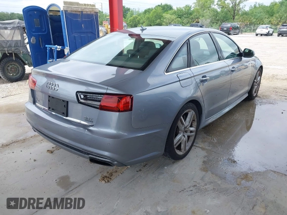 2016 Audi A6 3.0T Premium Plus with VIN WAUFGAFC1GN047352, listed as a IAAI auction lot 41934958 with 111,834 mi miles. Bid and sale history available at carsss.com. Image 4.